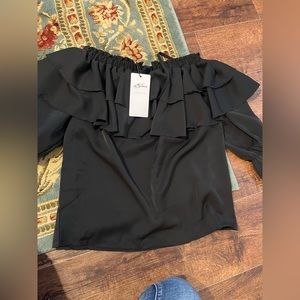 Black iff shoulder /wide neck/multi wear too with ruffles